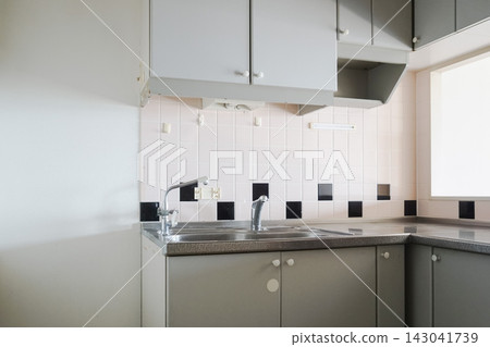 Old kitchen before renovation, inside the apartment Old kitchen before renovation, inside the apartment 143041739