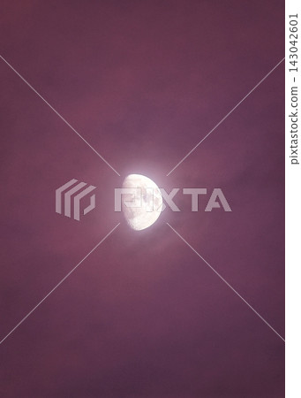 A white moon in a red sky A white moon in a red sky 143042601
