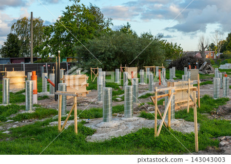 Prepared Pile Foundation for Modular Home Construction at Residential Building Site Prepared Pile Foundation for Modular Home Construction at Residential Building Site 143043003