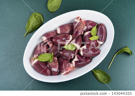 Organic turkey hearts with onion and herbs ready to cook Organic turkey hearts with onion and herbs ready to cook 143044103