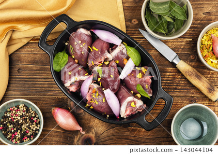 Organic turkey hearts with onion and herbs ready to cook Organic turkey hearts with onion and herbs ready to cook 143044104