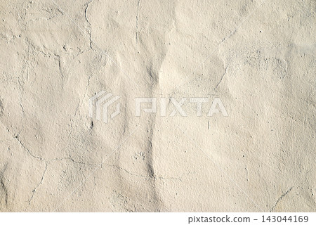 Texture background of a clean light beige plaster concrete wall surface 143044169