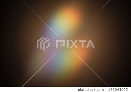 Soft colorful light spectrum refracting across dark background, creating bokeh effects Soft colorful light spectrum refracting across dark background, creating bokeh effects 143045035