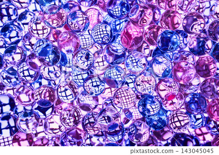 Translucent spheres creating vibrant textured background with light reflections Translucent spheres creating vibrant textured background with light reflections 143045045