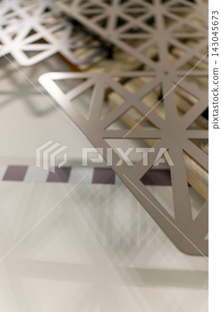 A modern background with a close-up of a geometric grid. A modern background with a close-up of a geometric grid. 143045673