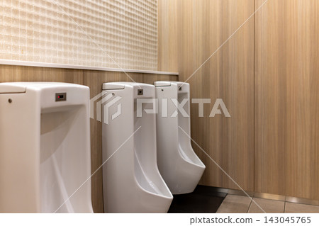 A clean and modern men's restroom. A clean and modern men's restroom. 143045765