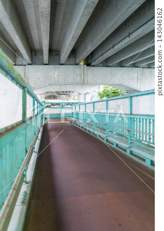 Barrier-free pedestrian overpass with ramps Barrier-free pedestrian overpass with ramps 143046162