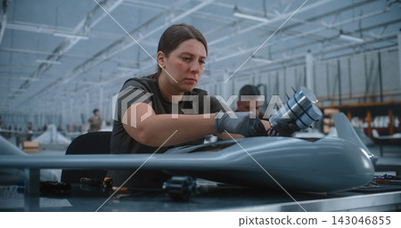 Manual Assembly of Unmanned Aerial Vehicle Electronics in Cleanroom Facility Manual Assembly of Unmanned Aerial Vehicle Electronics in Cleanroom Facility 143046855