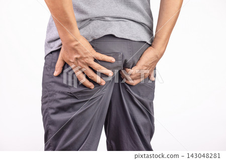 Hemorrhoidal pain, man with hemorrhoids on white background. Hemorrhoidal pain, man with hemorrhoids on white background. 143048281