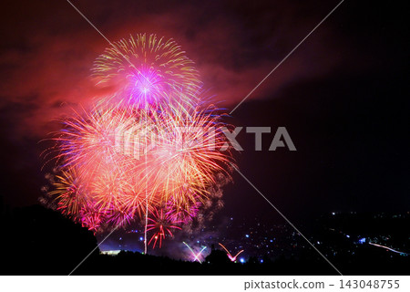 Fireworks blooming in the night sky Fireworks blooming in the night sky 143048755