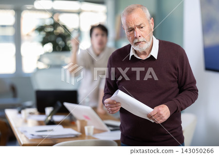 Elderly man quits his job. His boss yells at him and throws him out Elderly man quits his job. His boss yells at him and throws him out 143050266