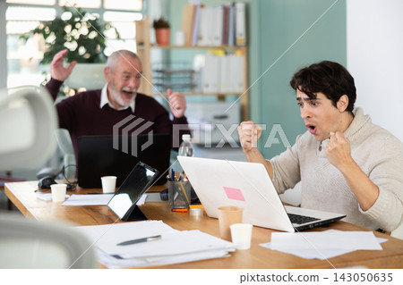 Men office employees is genuinely happy and elated Men office employees is genuinely happy and elated 143050635