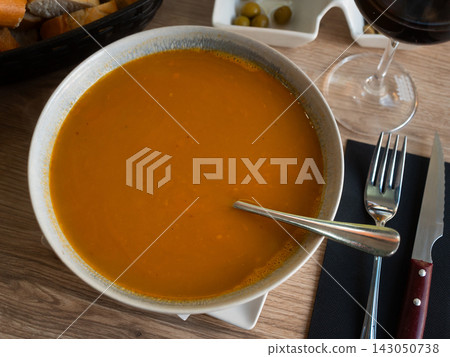 Traditional Spanish soup with seafood in a bowl view from above 143050738