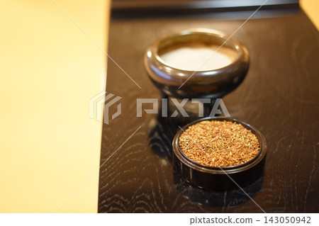 Incense offering (incense burner, powdered incense) Incense offering (incense burner, powdered incense) 143050942