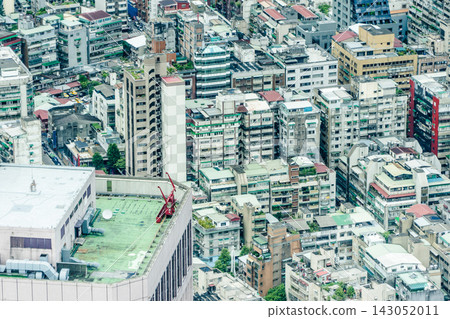 Panoramic aerial view of cityscape, skyline and urban sprawl of Taipei in Taiwan under sun, bright blue sky Panoramic aerial view of cityscape, skyline and urban sprawl of Taipei in Taiwan under sun, bright blue sky 143052011