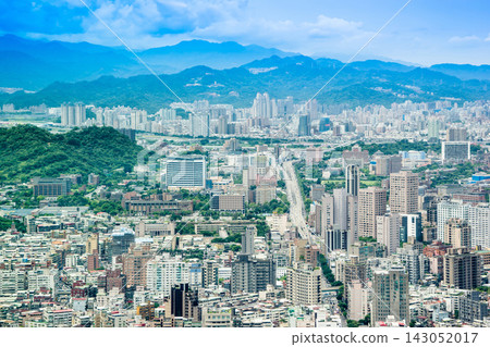 Panoramic aerial view of cityscape, skyline and urban sprawl of Taipei in Taiwan under sun, bright blue sky Panoramic aerial view of cityscape, skyline and urban sprawl of Taipei in Taiwan under sun, bright blue sky 143052017