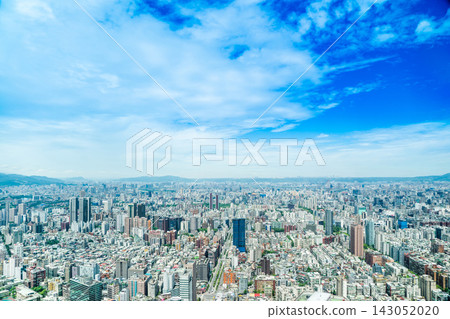 Panoramic aerial view of cityscape, skyline and urban sprawl of Taipei in Taiwan under sun, bright blue sky Panoramic aerial view of cityscape, skyline and urban sprawl of Taipei in Taiwan under sun, bright blue sky 143052020