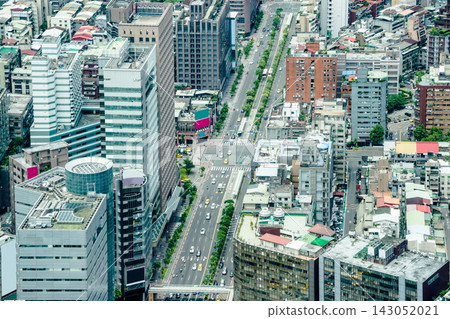 Panoramic aerial view of cityscape, skyline and urban sprawl of Taipei in Taiwan under sun, bright blue sky Panoramic aerial view of cityscape, skyline and urban sprawl of Taipei in Taiwan under sun, bright blue sky 143052021