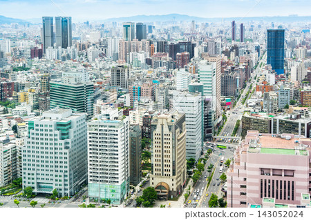 Panoramic aerial view of cityscape, skyline and urban sprawl of Taipei in Taiwan under sun, bright blue sky Panoramic aerial view of cityscape, skyline and urban sprawl of Taipei in Taiwan under sun, bright blue sky 143052024