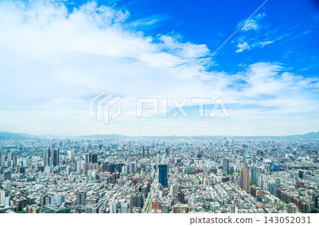 Panoramic aerial view of cityscape, skyline and urban sprawl of Taipei in Taiwan under sun, bright blue sky Panoramic aerial view of cityscape, skyline and urban sprawl of Taipei in Taiwan under sun, bright blue sky 143052031