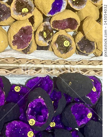 Vibrant dyed purple quartz geode slices in Mittenwald, Bavaria, Germany Vibrant dyed purple quartz geode slices in Mittenwald, Bavaria, Germany 143054032
