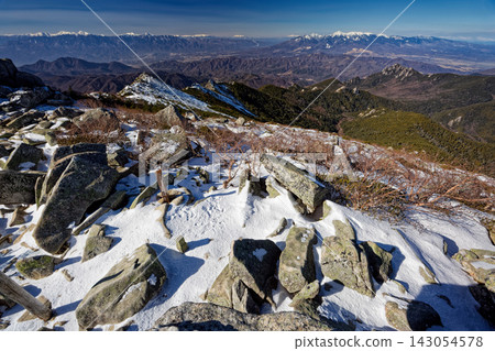 Views of the Yatsugatake, Ontake, Central Alps, and Southern Alps from the summit of Mt. Kinpusan in winter. Views of the Yatsugatake, Ontake, Central Alps, and Southern Alps from the summit of Mt. Kinpusan in winter. 143054578