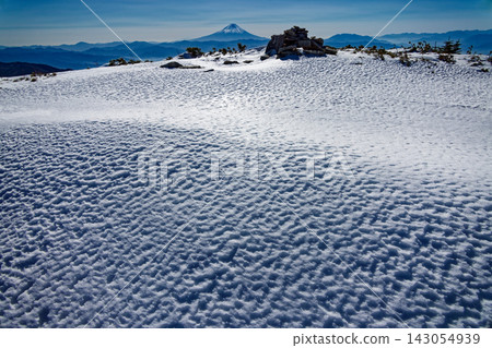 The snowfields on the summit of Mt. Kinpu in winter and Mt. Fuji The snowfields on the summit of Mt. Kinpu in winter and Mt. Fuji 143054939