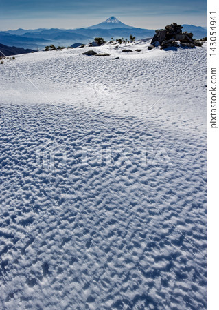 The snowfields on the summit of Mt. Kinpu in winter and Mt. Fuji The snowfields on the summit of Mt. Kinpu in winter and Mt. Fuji 143054941