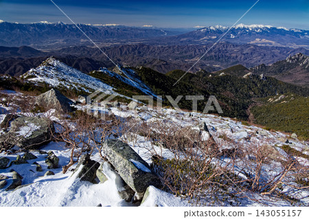 The mountain range of Yatsugatake, Ontake, and the Central Alps as seen from the summit of Mt. Kinpu in winter. 143055157