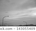 Evening cloudy sky and streetlights 143055409