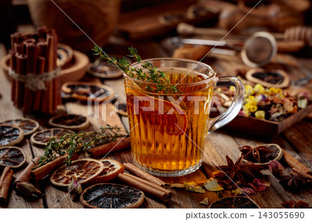 Herbal tea with thyme and dried citrus. Herbal tea with thyme and dried citrus. 143055690