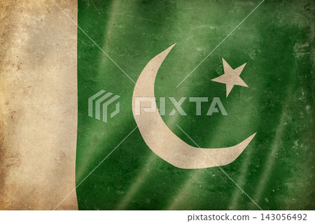Old vintage flag of Pakistan, worn and stained Old vintage flag of Pakistan, worn and stained 143056492