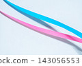 Light blue and pink ribbons 143056553
