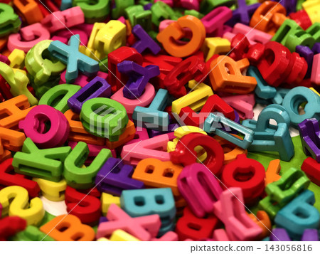 Colorful plastic alphabet letters on the table for craft Colorful plastic alphabet letters on the table for craft 143056816