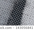 Diagonal shadow across textured metal diamond plate with alternating light and dark bands 143056841