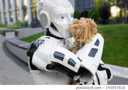 Humanoid robotic machine gently hugging small fluffy brown dog 143057818