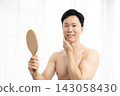 Hair removal complete! Japanese man undergoes permanent beard removal. 143058430