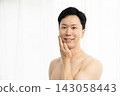 A man who had his beard removed. 143058443