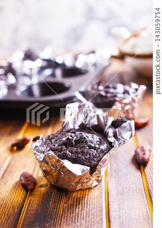 Chocolate chip muffins mini size on a board, double chocolate muffins, Chocolate chip muffins mini size on a board, double chocolate muffins, 143059754