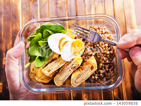 buckwheat with eggs and chicken rolls, ideal for healthy eating and fitness nutrition buckwheat with eggs and chicken rolls, ideal for healthy eating and fitness nutrition 143059838
