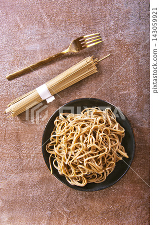 Pasta, buckwheat noodles cooking on plate Pasta, buckwheat noodles cooking on plate 143059921