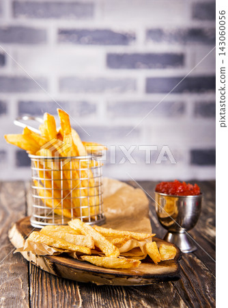 fried potato with tomato sauce fried potato with tomato sauce 143060056