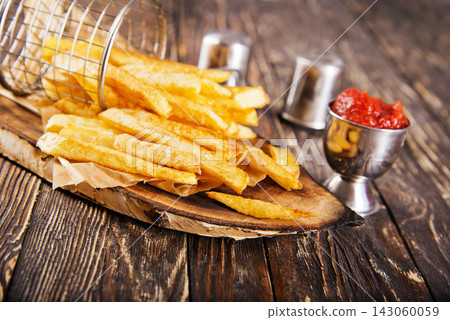 fried potato with tomato sauce fried potato with tomato sauce 143060059