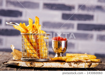 fried potato with tomato sauce fried potato with tomato sauce 143060060