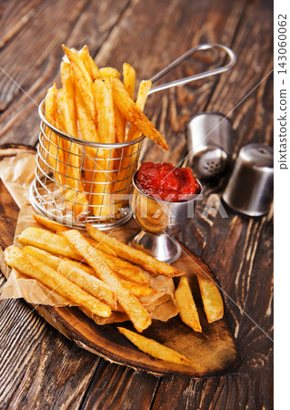 fried potato with tomato sauce fried potato with tomato sauce 143060062