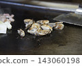 Grilling the oysters for oyster okonomiyaki Grilling the oysters for oyster okonomiyaki 143060198