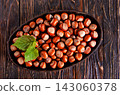 Close up view of hazelnuts on a table 143060378