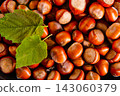 Close up view of hazelnuts on a table 143060379