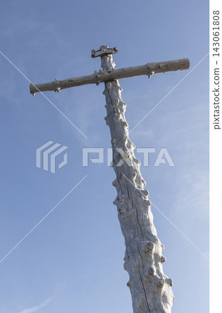 Summit cross Hinteres Hornle mountain in Bavaria, Germany Summit cross Hinteres Hornle mountain in Bavaria, Germany 143061808