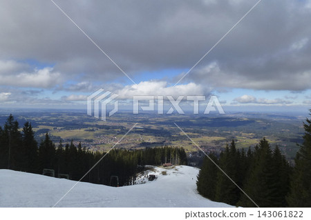 Snowy landscape at Hornle Mountain, alpine foothills in Bavaria, Germany Snowy landscape at Hornle Mountain, alpine foothills in Bavaria, Germany 143061822